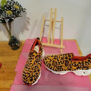 Designers "spikey" tennis shoes animal print size 10 new without tags
